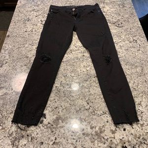 Black distressed skinny jeans